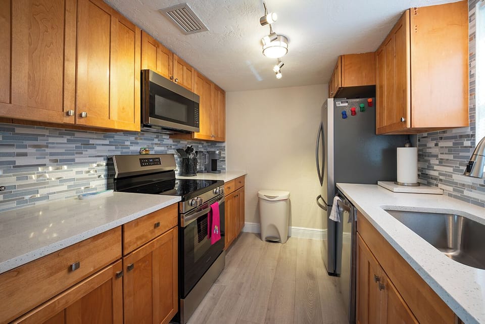 Fully Equipped Kitchen has all the appliances, dishware, cookware and tableware to entertain