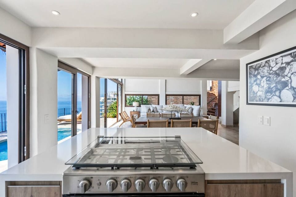 Cook in style with ocean views and access to your private pool in this Puerto Vallarta luxury rental. Perfect for a family vacation near Playa Conchas Chinas