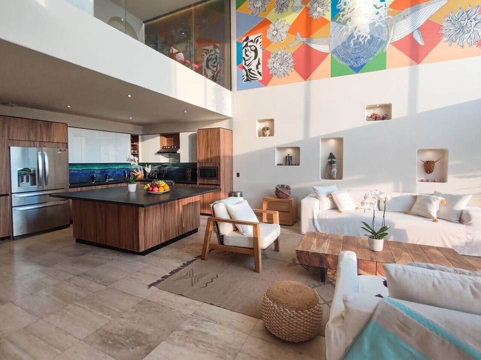 Fully equipped kitchen with all the essentials, in the center of the living space.