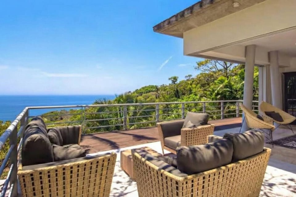 Enjoy stunning ocean + jungle views in a peaceful, private setting. From November–May, spot humpback whales in the distance right from your huge panoramic terraces, with plenty of comfortable lounge seating to relax, sip coffee, and watch the sunset.
