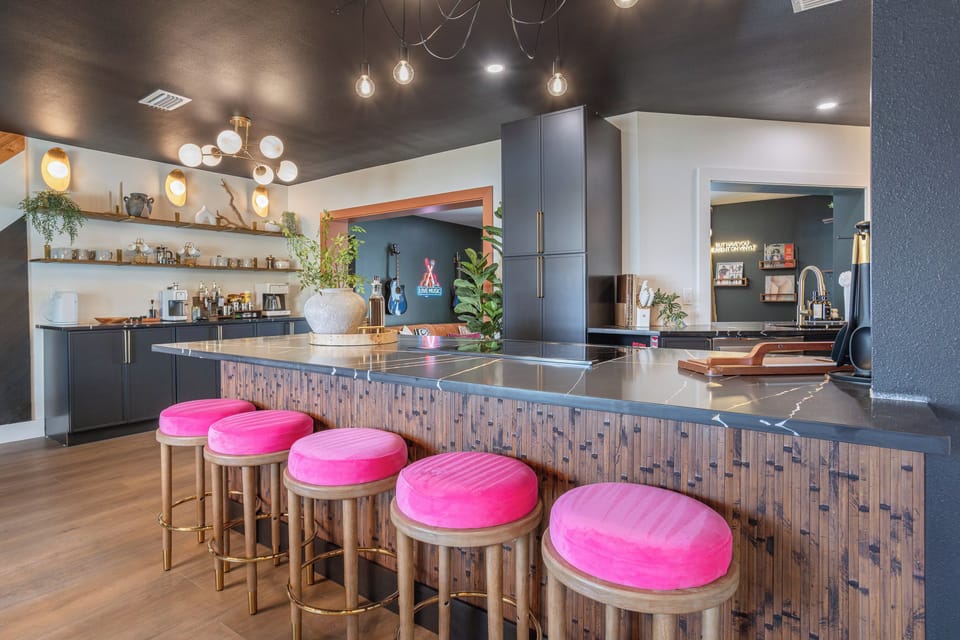 Kitchen view from dining room with breakfast bar and bar stool seating, perfect for enjoying family meals