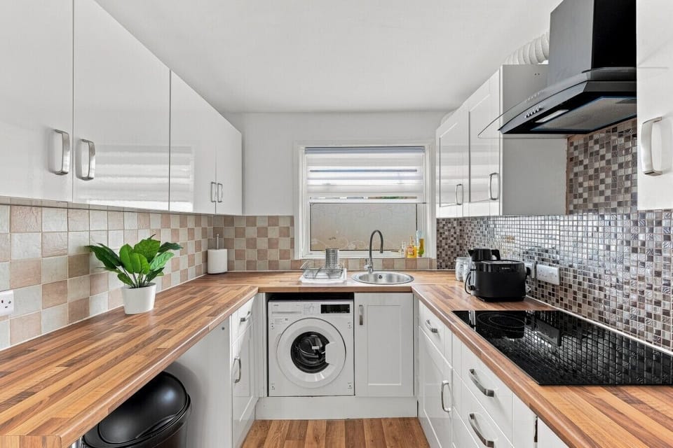 A fully equipped kitchen with everything you need to prepare and enjoy a home cooked meal.