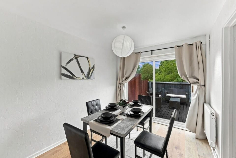 Dining area with seating for up to 4 guests.
