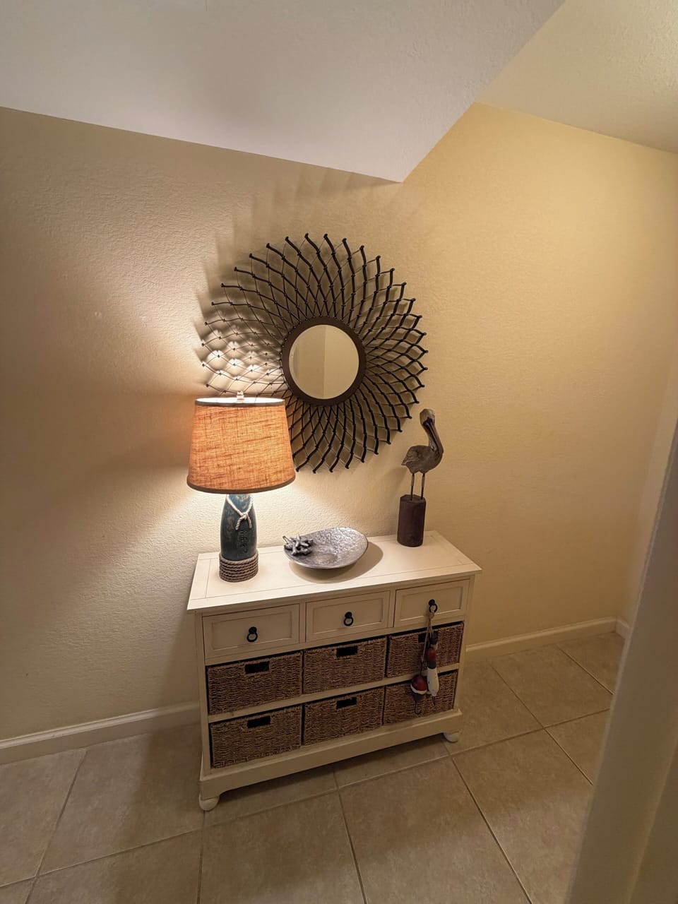Refresh in your private bathroom with modern fixtures and thoughtful touches like woven storage baskets.