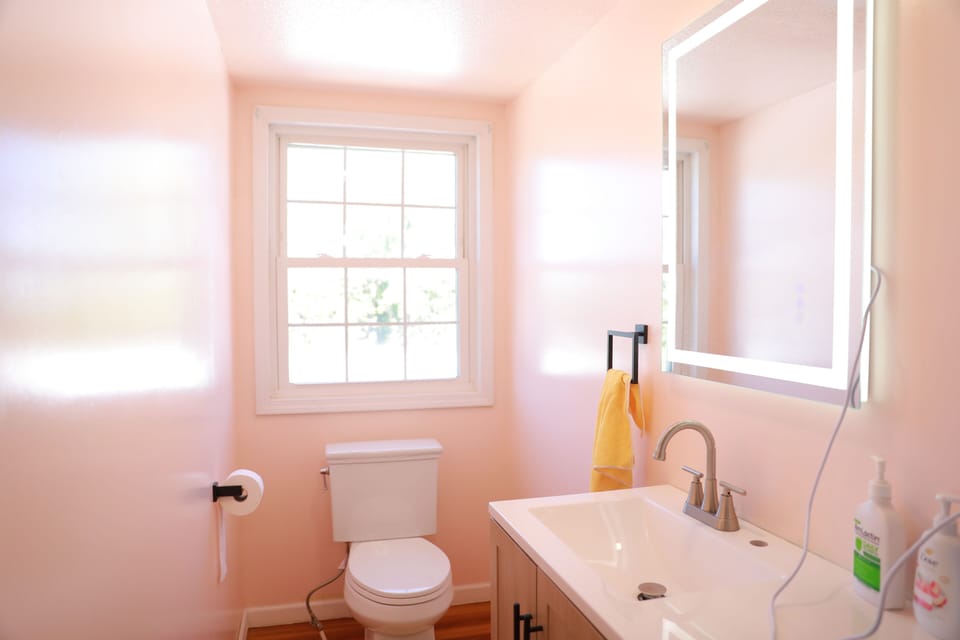 separated bathroom and shower