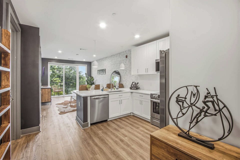 Sleek and bright with modern appliances and a view for delightful meals!