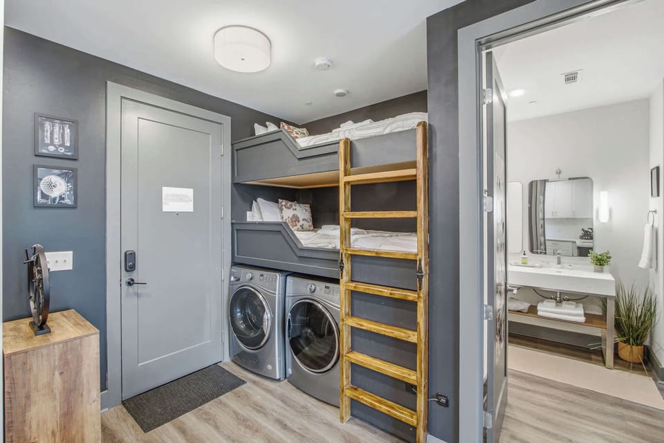 Bunk Room, fun and functional with ladder access and in-unit laundry for ultimate convenience!