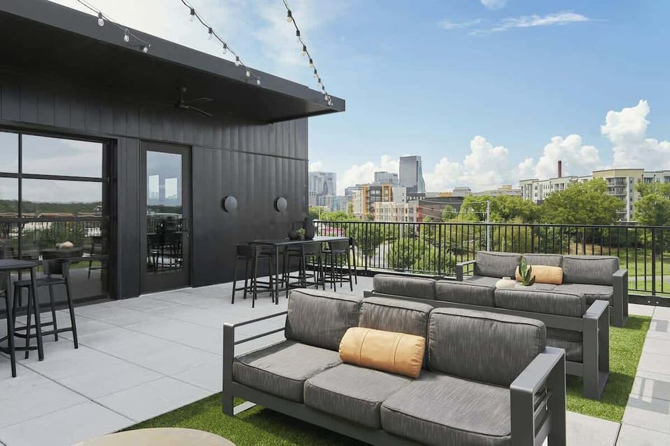 Rooftop Lounge, enjoy stunning skyline views while unwinding on stylish outdoor seating!