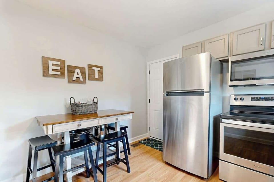 Modern appliances meet inviting decor in this charming culinary space!
