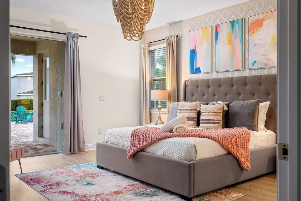 Elegant bedroom with king bed, soft linens, and stylish décor