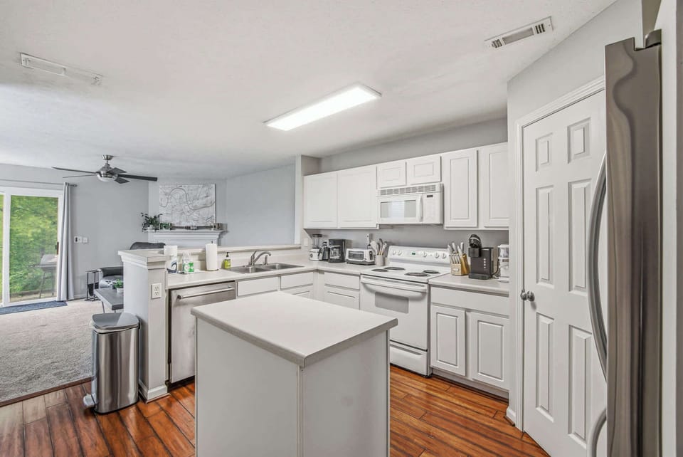 Kitchen Paradise, bright and airy kitchen with modern appliances and a perfect view for meal prep!