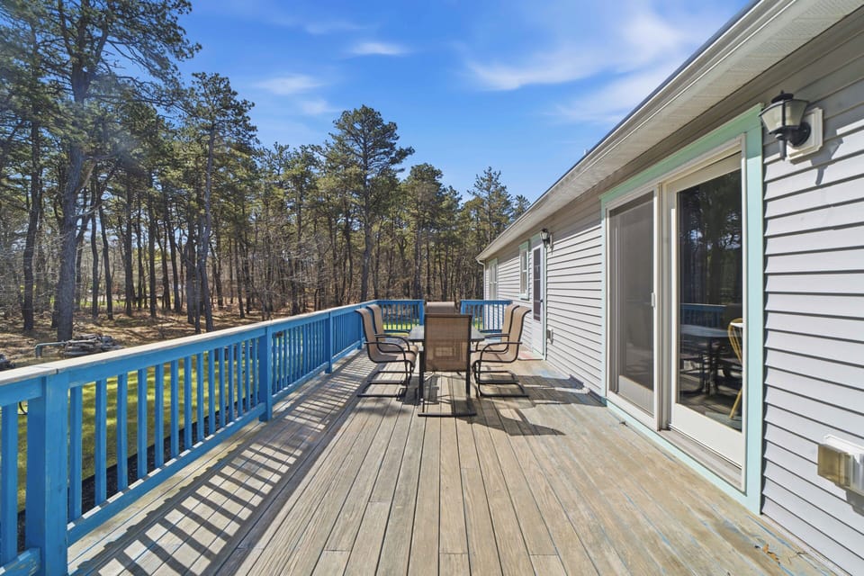 Step onto your private deck with outdoor dining and forest views for peaceful morning coffee or evening relaxation.