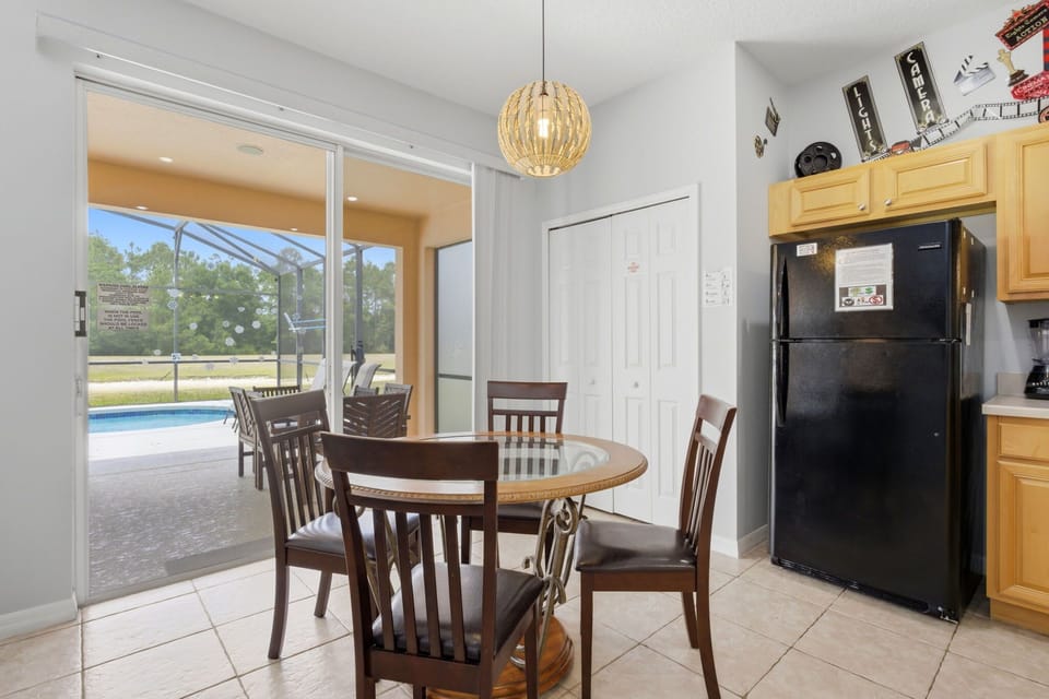 Breakfast nook overlooking the pool—perfect for casual meals or coffee