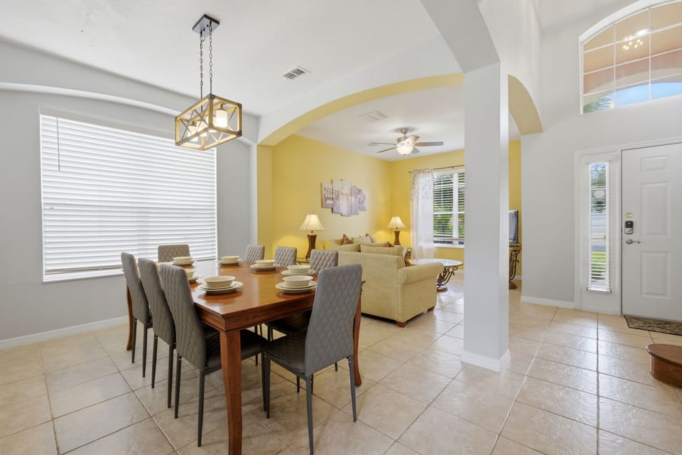 Open layout flows seamlessly from entry to dining and main living spaces