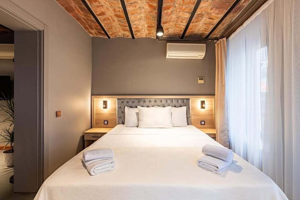 Superior Triple Room, City View | Iron/ironing board, free WiFi