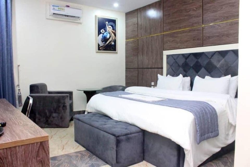 Economy Room, Balcony, City View | Desk, laptop workspace, free WiFi