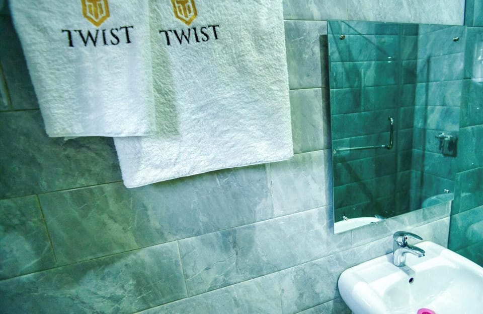 Comfort Room, Balcony, City View | Bathroom | Towels, soap, shampoo, toilet paper