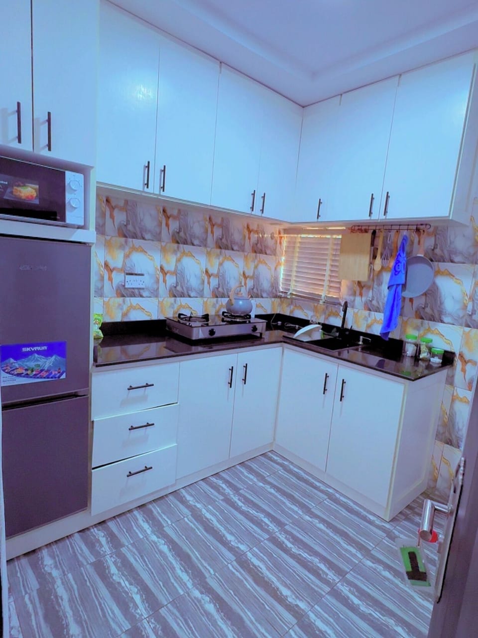 Economy Apartment, Balcony, City View | Private kitchen | Fridge, microwave, oven, stovetop