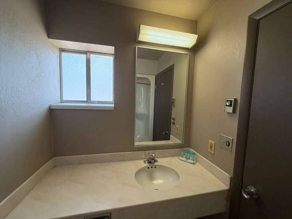 Shower, towels, soap, shampoo