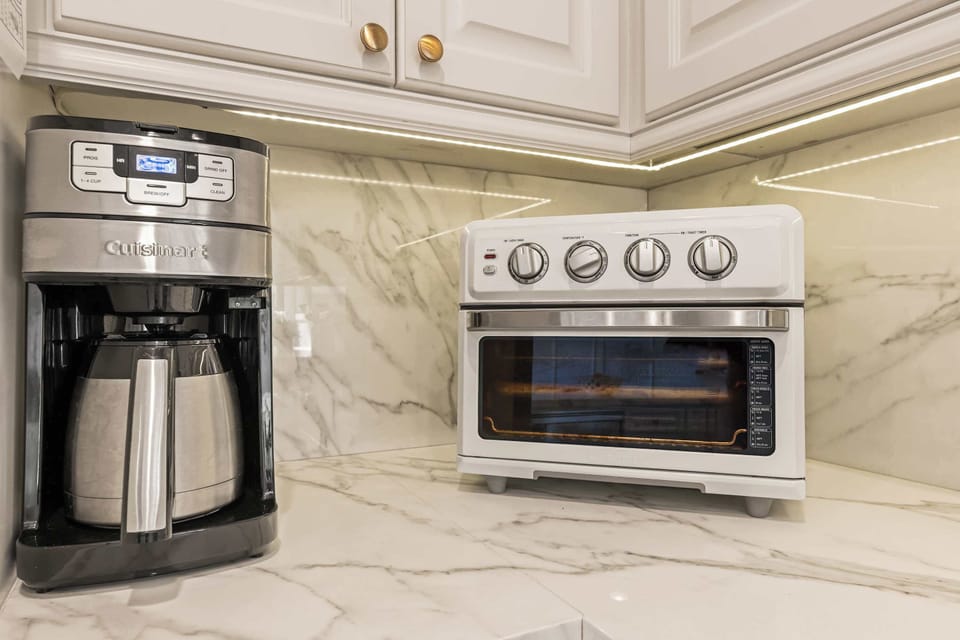 Countertop setup for coffee, toast, and simple meals.