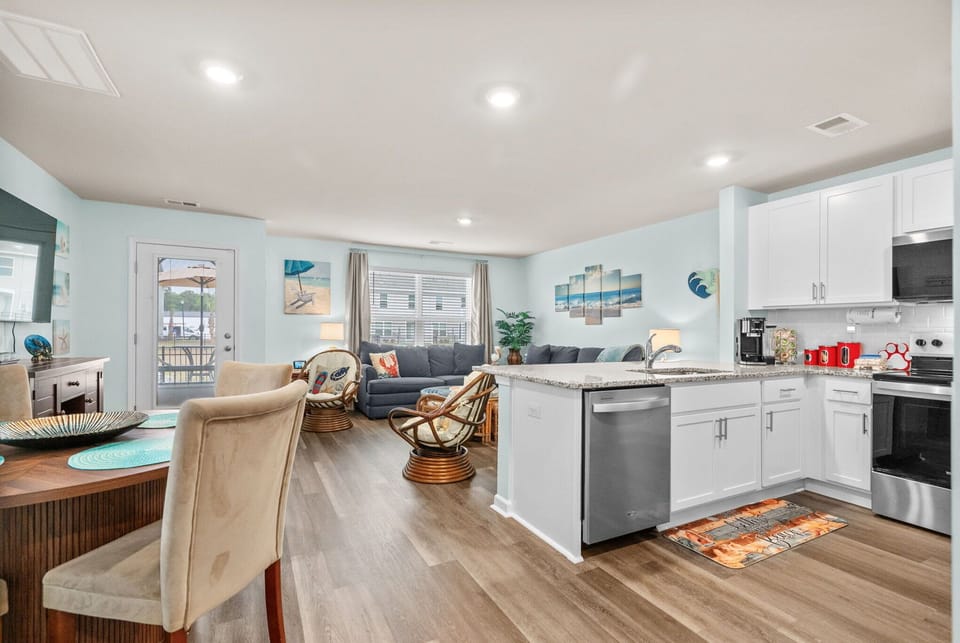 Open, airy, and made for togetherness — the kitchen, dining, and living areas flow seamlessly into one beautiful shared space.