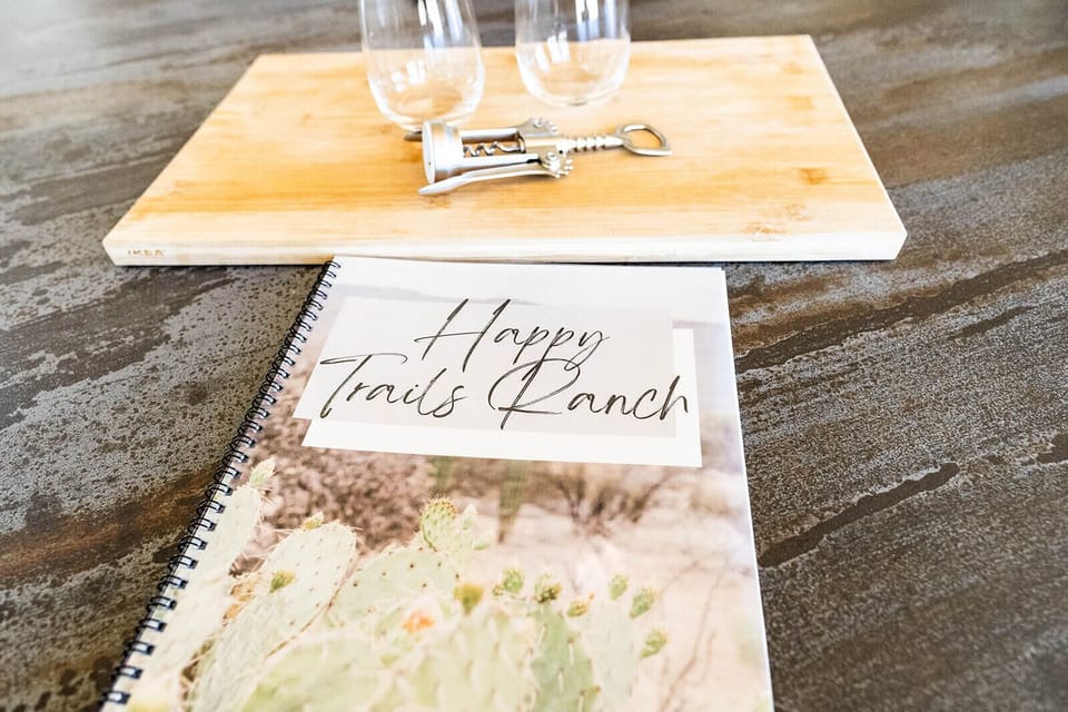 Thoughtful welcome touches with wine service and a custom guest guide