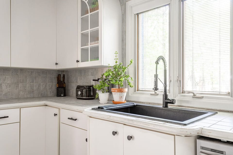 Farmhouse sink with garden views