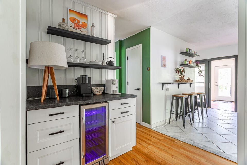 Perfect bar spot conveniently located between the kitchen and living room
