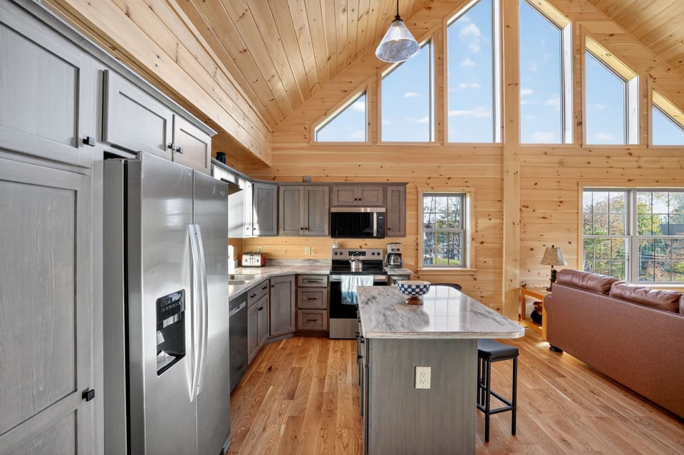 View of kitchen with large windows