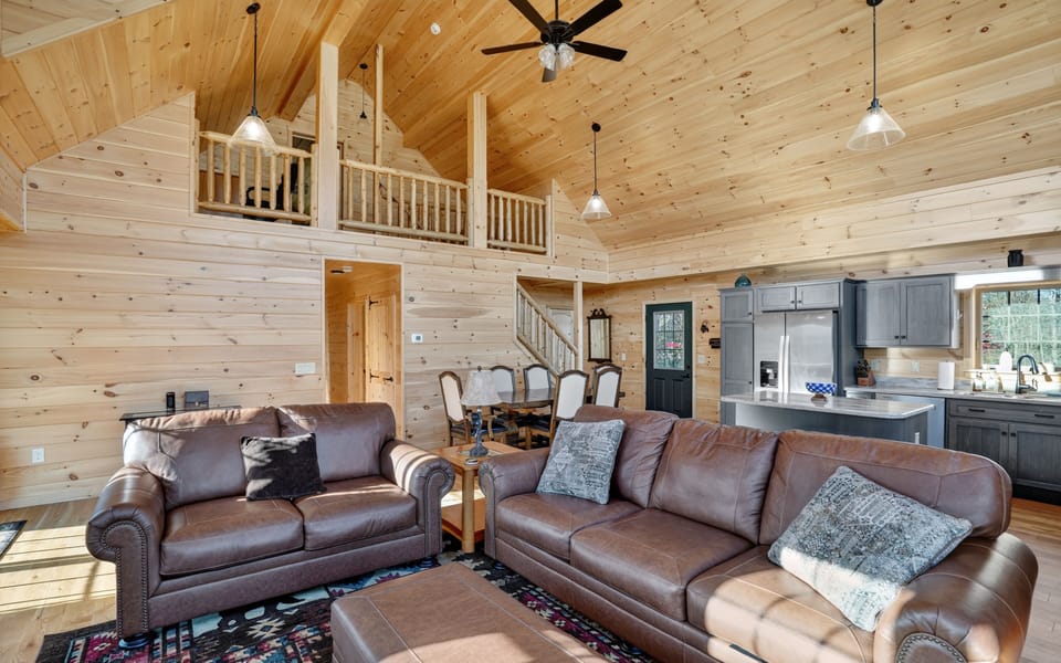 Cozy great room with vaulted ceilings and plenty of natural light
