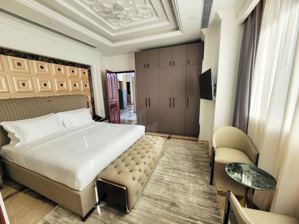 Deluxe Double Room, Balcony, Courtyard View | In-room safe, desk, laptop workspace, blackout drapes