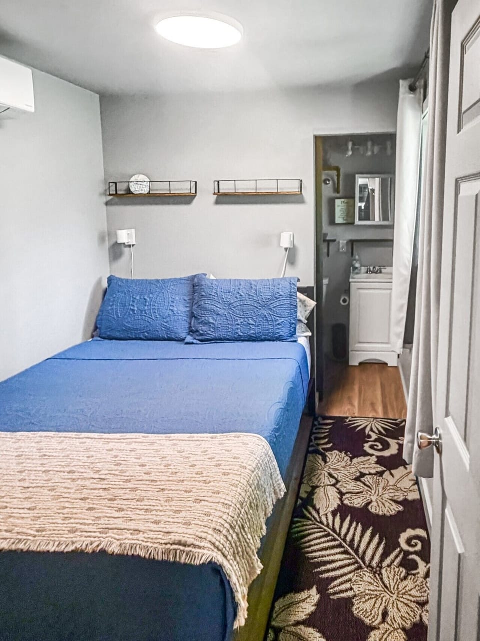 Bedroom with a super comfortable queen bed and cool A/C