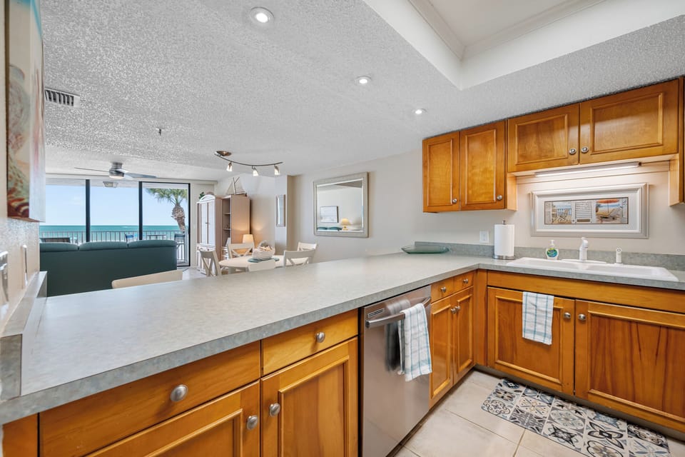 #103 Large updated kitchen with a breakfast bar and gulf view