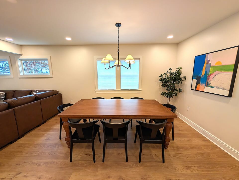 Spacious dining area with seating for 8 and stylish open-concept design
