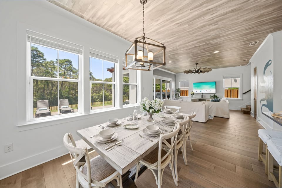 Gather the whole crew around the farmhouse table — seating for 8 with natural light pouring in.