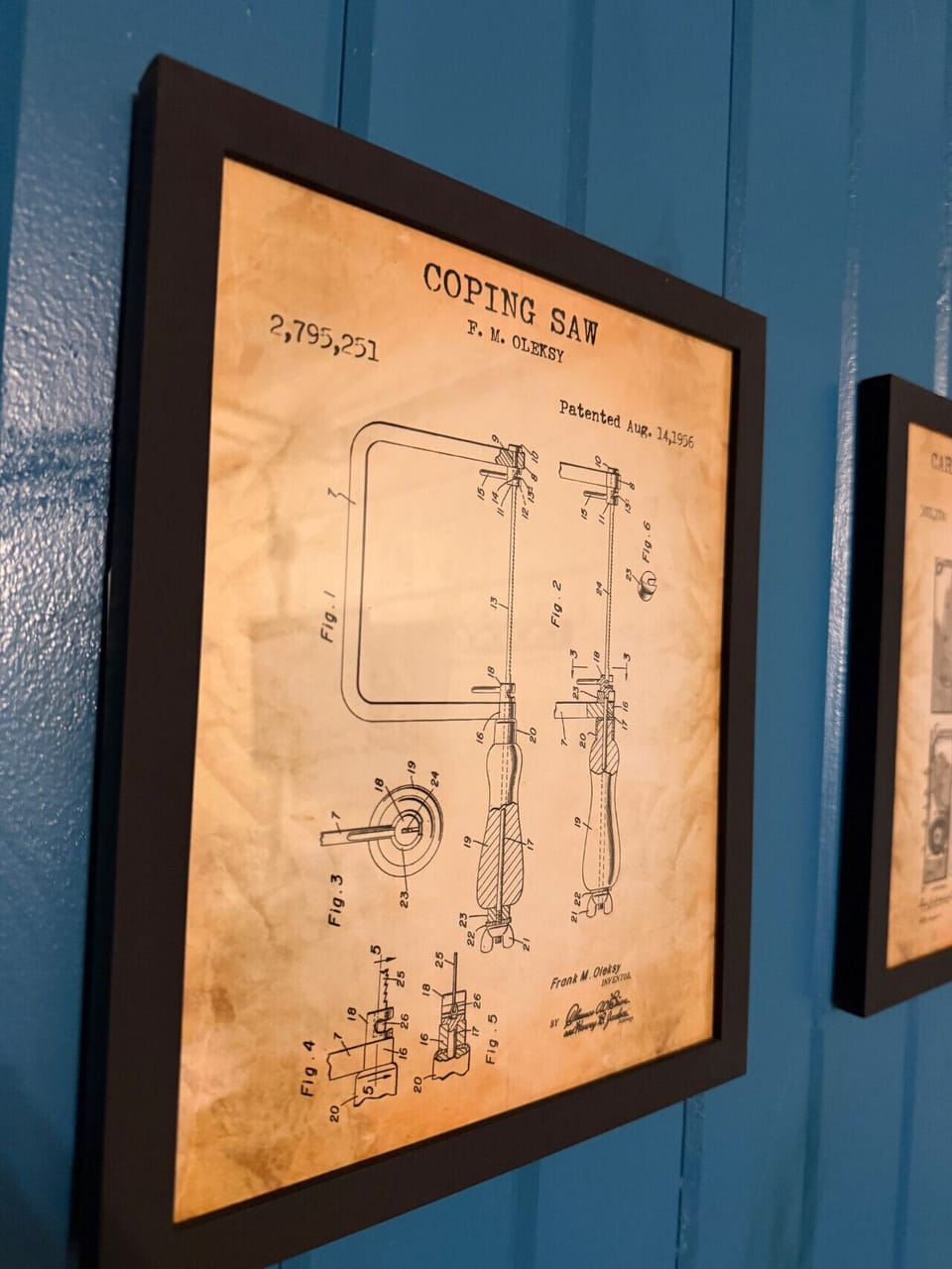 Coping Saw patent print framed on the accent wall