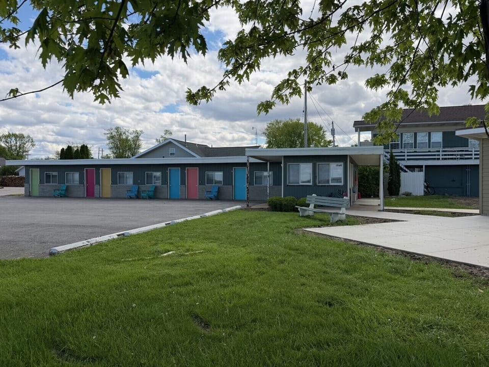 The Cedar — exterior of the converted 1950s motor court on Sandusky Bay