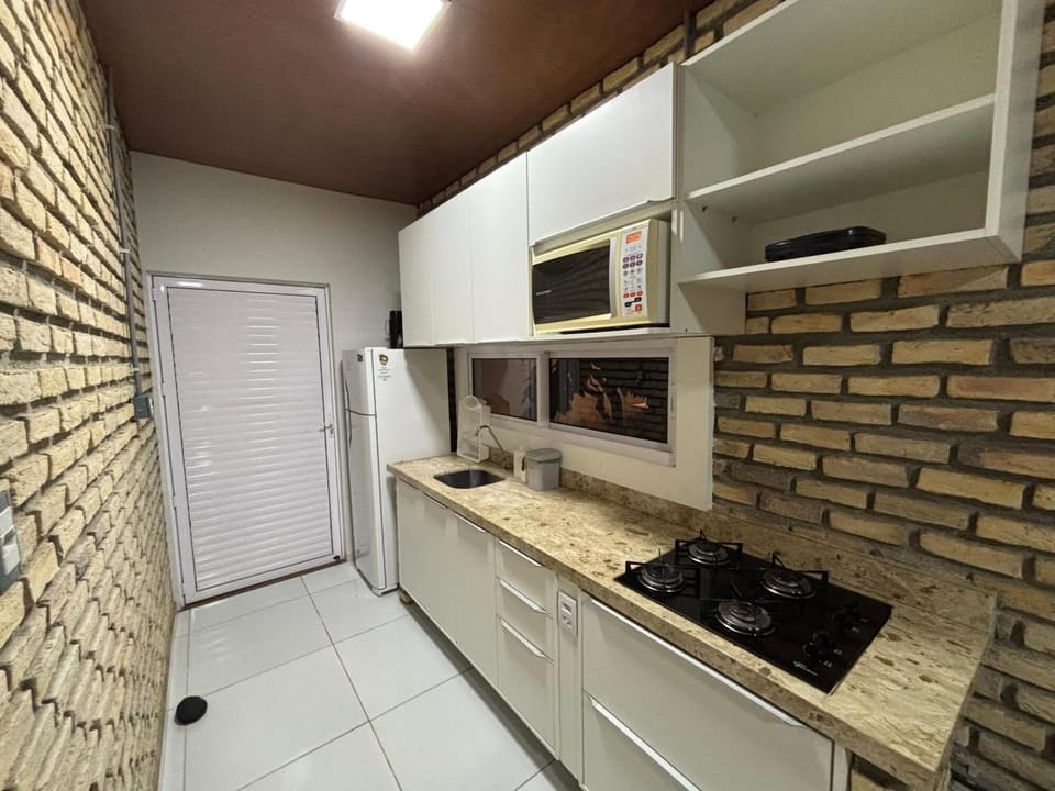 Comfort Chalet, Lanai, Garden View | Private kitchen | Full-size fridge, microwave, stovetop, cookware/dishes/utensils