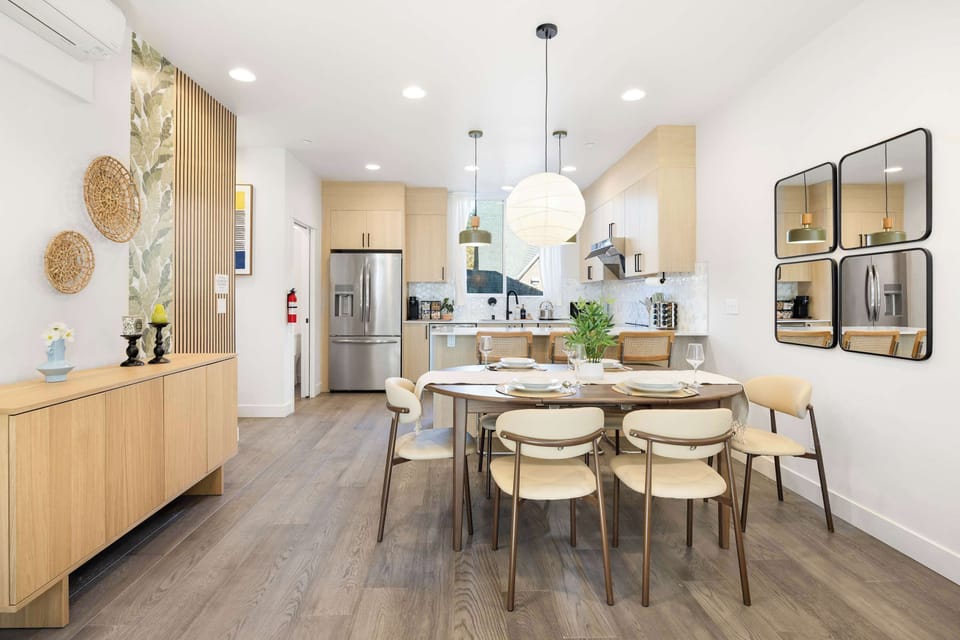 Open kitchen and dining setup ideal for group meals and connection.
