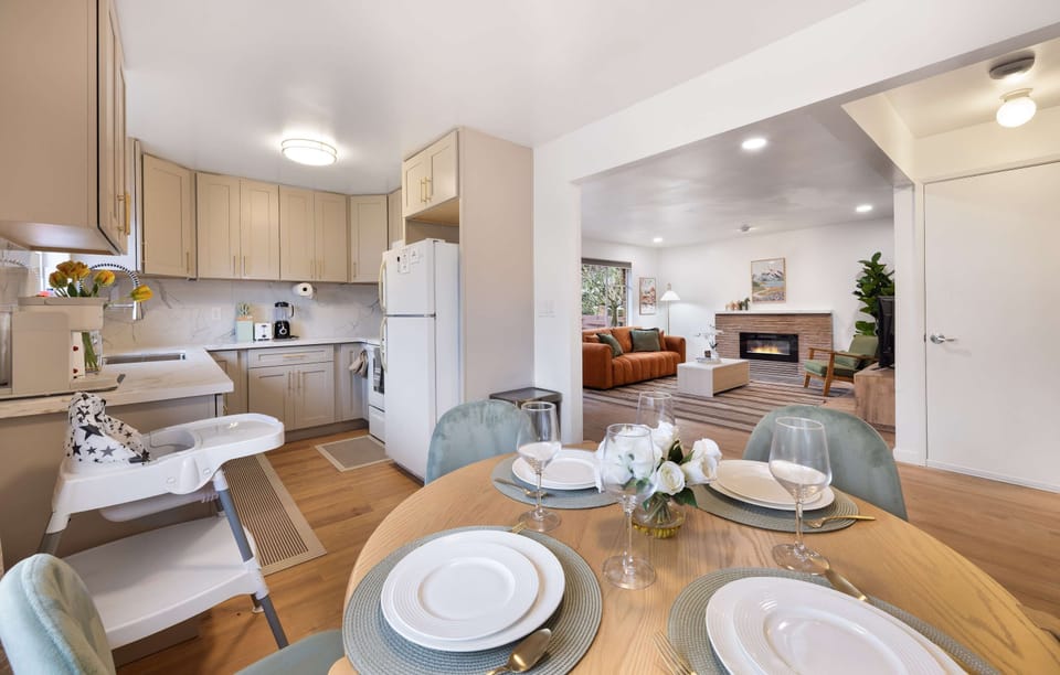 Open dining area flows into the kitchen and living room—perfect for gathering and shared meals.