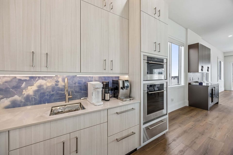 Microwave and Oven plus a water purrifier, coffee bean grinder and espresso machine