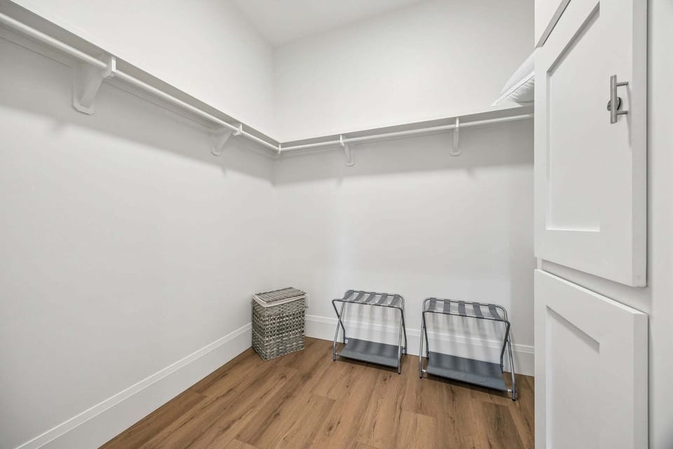 Walk in closet for third level guest bedroom