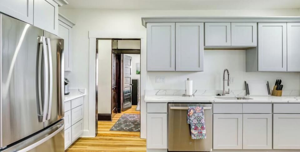 The kitchen features a welcoming coffee nook with complimentary coffee, perfect for starting your day comfortably.