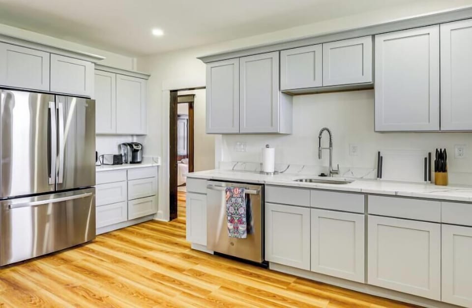 The kitchen features a welcoming coffee nook with complimentary coffee, perfect for starting your day ready to explore the city.