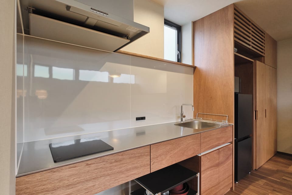 Comfort Condo | Private kitchen | Full-size fridge, microwave, stovetop, rice cooker
