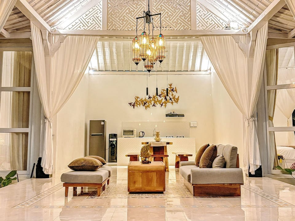 Two-Bedroom Villa with Private Pool | Living area | 32-inch flat-screen TV with cable channels