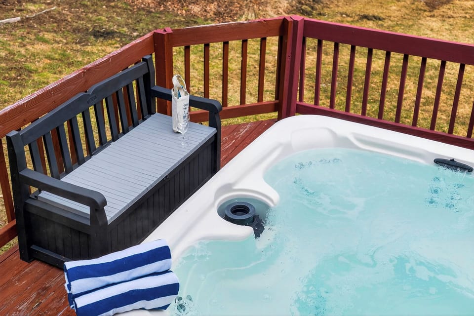 Ease into the private hot tub on the deck, with towels and a convenient bench close at hand.