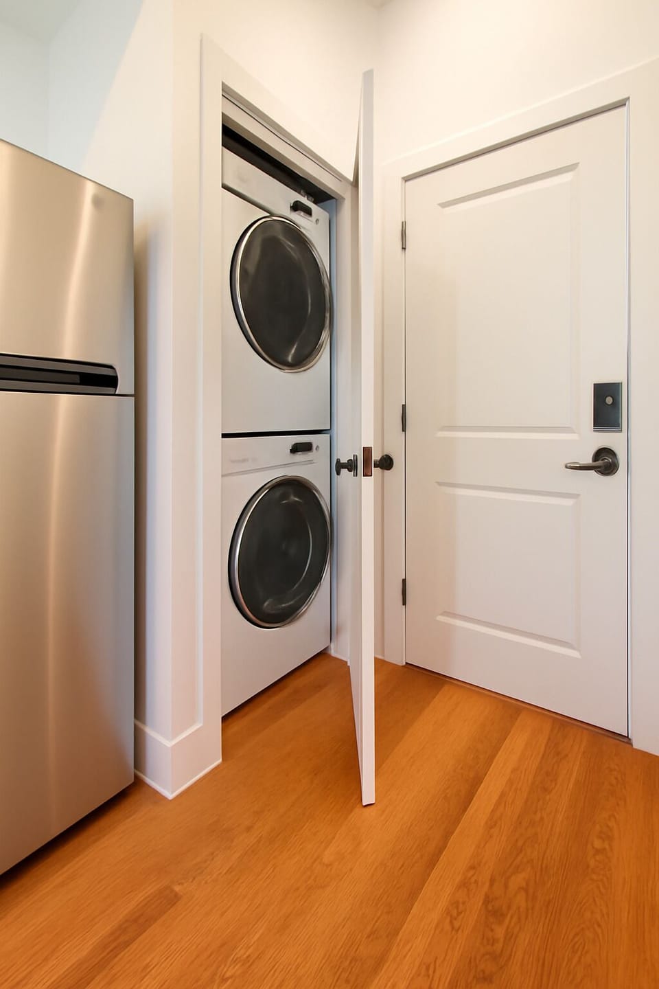 Convenient laundry area with washer and dryer for guest use.