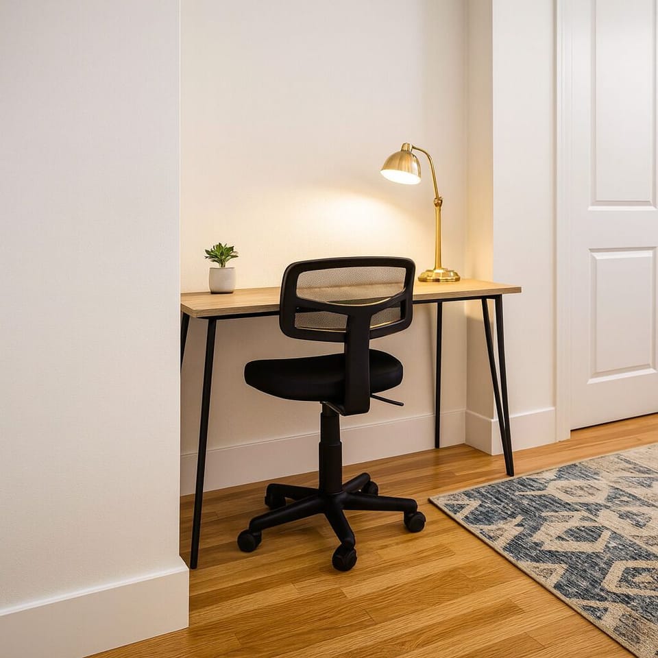 Dedicated workspace with desk and chair for productivity or study.
