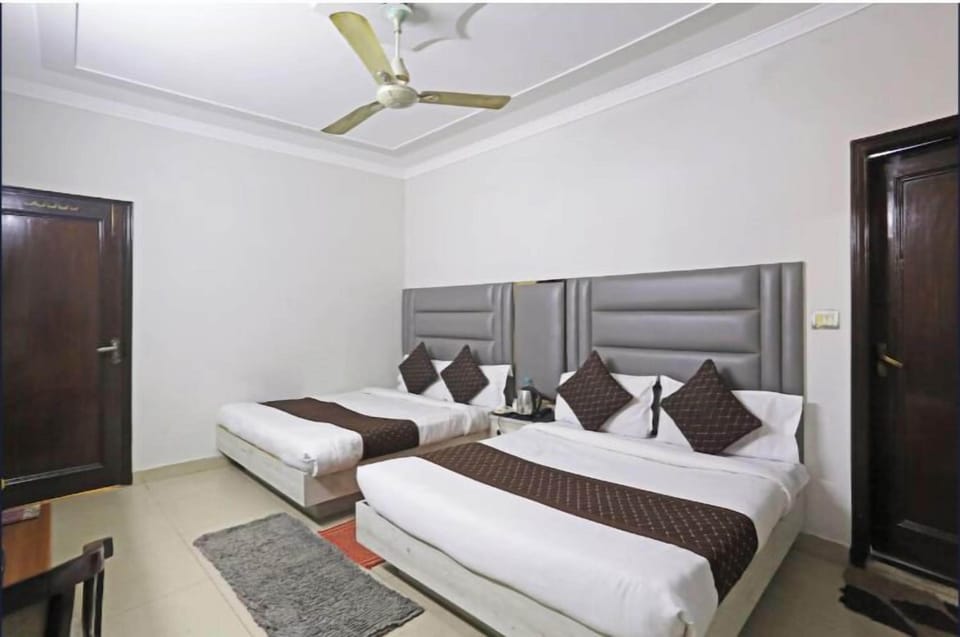 Family Quadruple Room, City View | Free WiFi, bed sheets